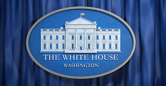 Image of the White House with the words "The White House Washington" written underneath 