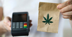 Package delivery with marijuana, payment terminal. Use and storage medical marijuana. Legalized narcotic herb. Treating pain, stress and insomnia. Registered medical hemp delivery agent