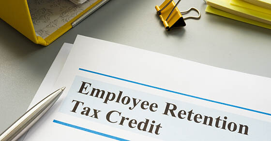 Employee retention tax credit papers and folder.