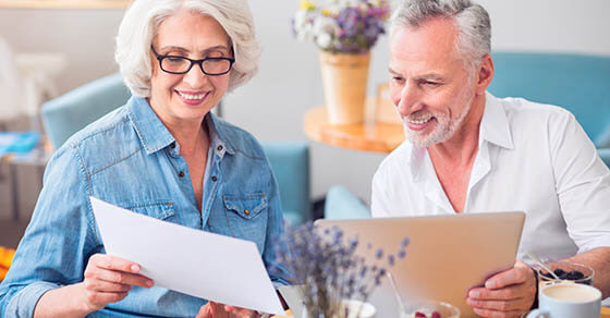 Positive couple discussing project