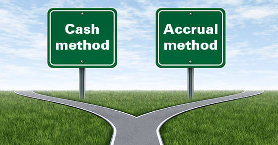 Cross roads with two blank road signs for copy space as a business concept and strategy symbol for difficult choices and challenges when selecting the right strategic path for financial planning.