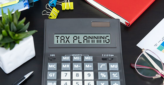 image of a calendar with the screen saying "TAX PLANNING"