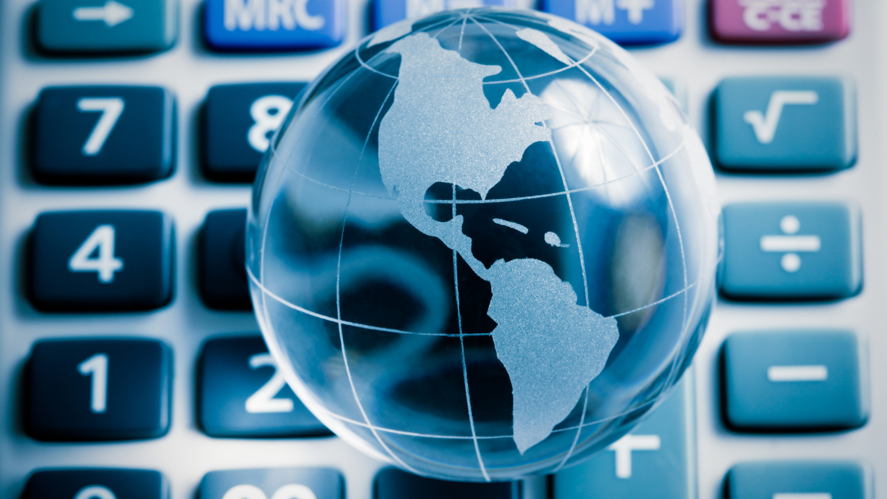 image of the globe above a calculator