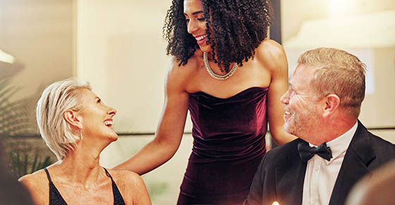 Senior, party or couple of friends at a celebration or luxury new year at a social event on holiday. Relaxing, happy or successful mature people enjoy talking, bonding or speaking at fun dinner gala