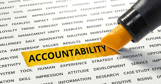 Word Accountability highlighted with marker on paper of other related words.business success concept.